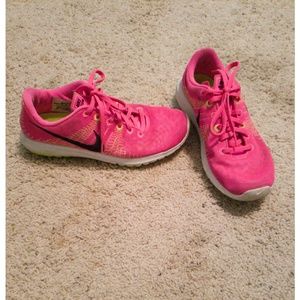 Hot pink Nike sneakers